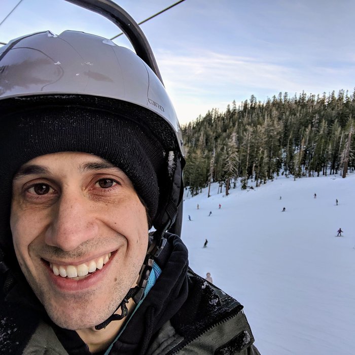 Smiling selfie on the ski lift. Click for full size.