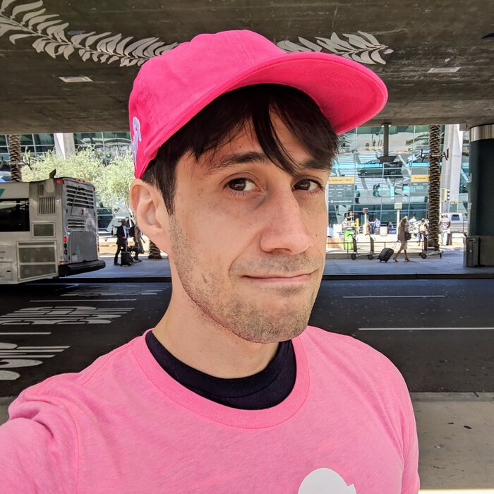 Pablo in a Lyft hat and Lyft T-Shirt. Click for full size.