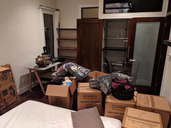Boxes in a room, moving in. Click for full size.